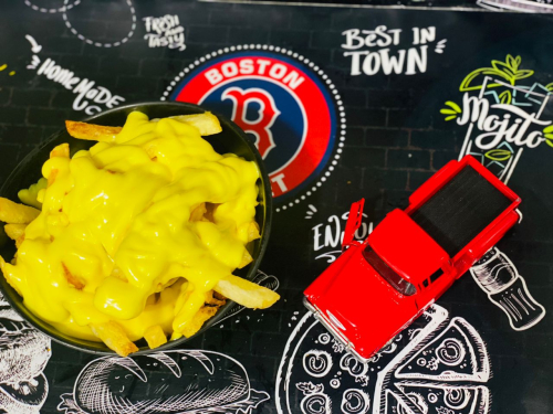 Frites sauce fromagère 