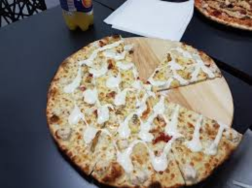 Pizza boisée poulet 